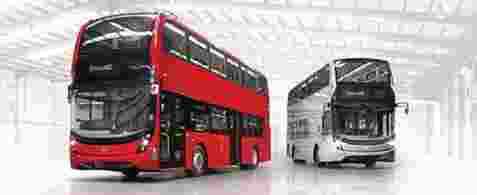 A large red double decker bus turned to the left, and a silver double decker bus, turned to the right. 