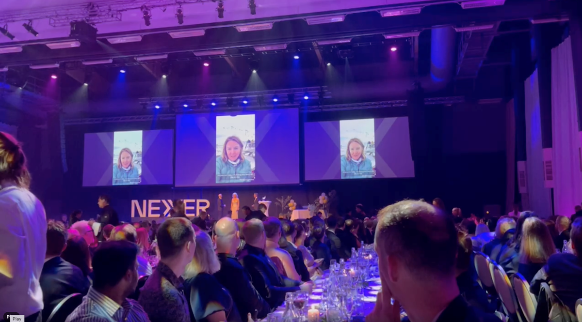 Hilary Stephenson onscreen at the Wow awards after winning 'Manager of the Year'