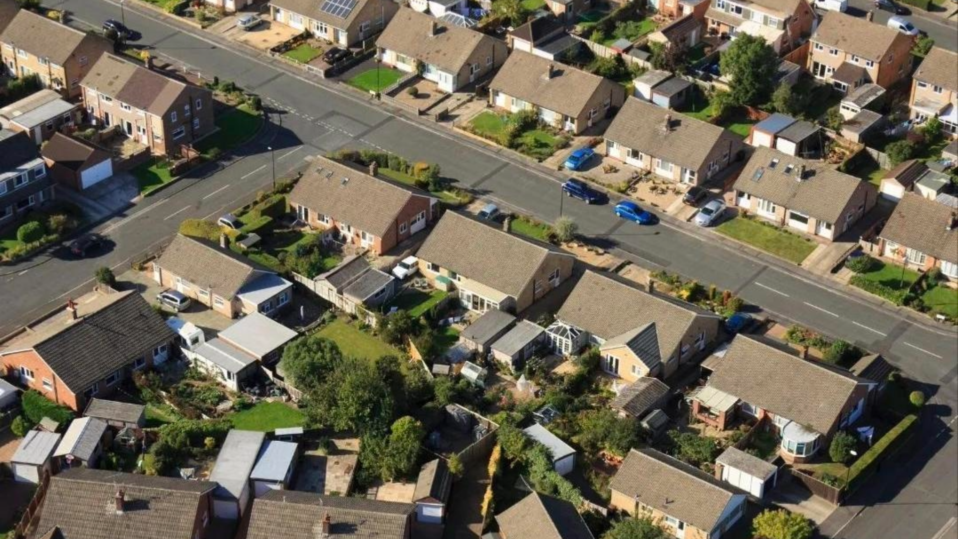 An arial view of two streets of houses