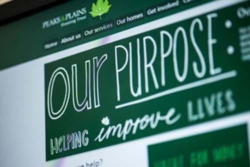 A slanted screenshot of the Peaks and Plains website, with a focus on the words "Our Purpose"